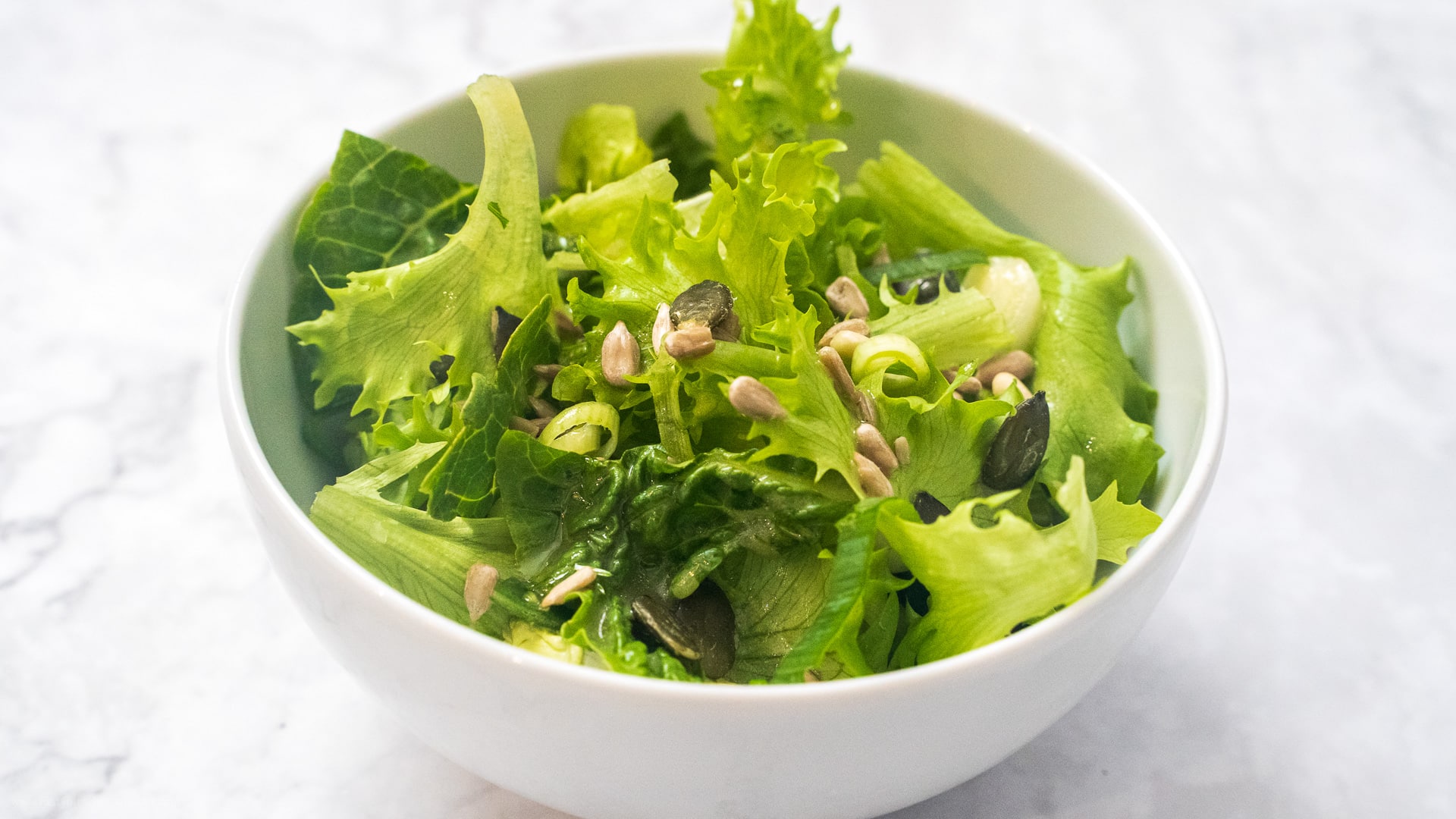 Fresh green salad with assorted leafy vegetables