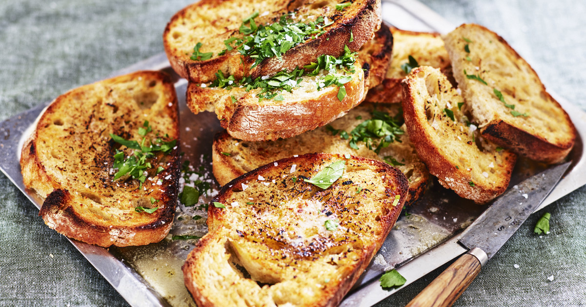 Freshly baked garlic bread served hot
